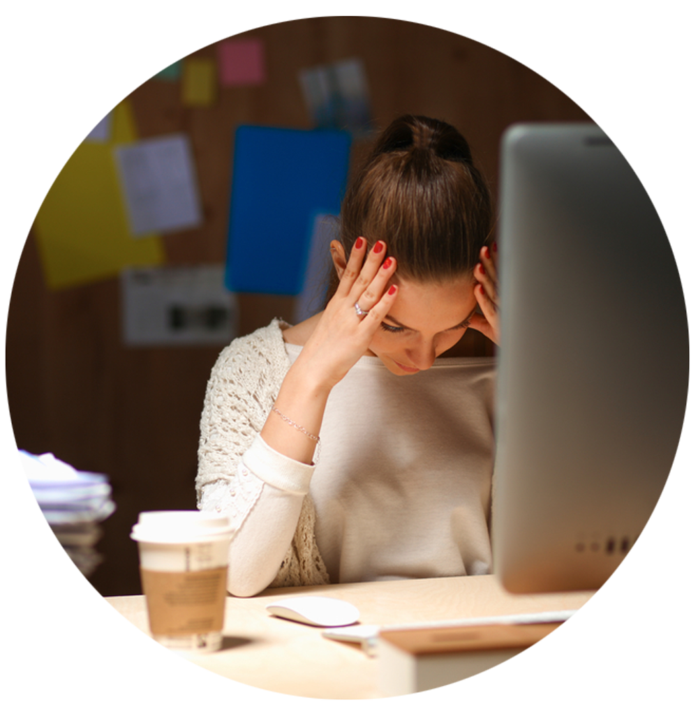 A frustrated manager with her hands on her head